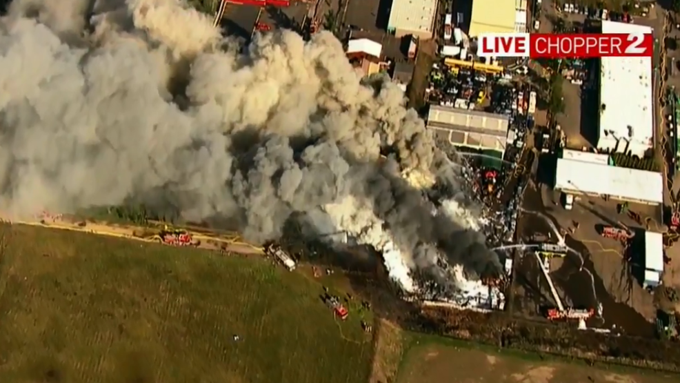 Homes burning, school evacuated as massive fire burns at NE Portland