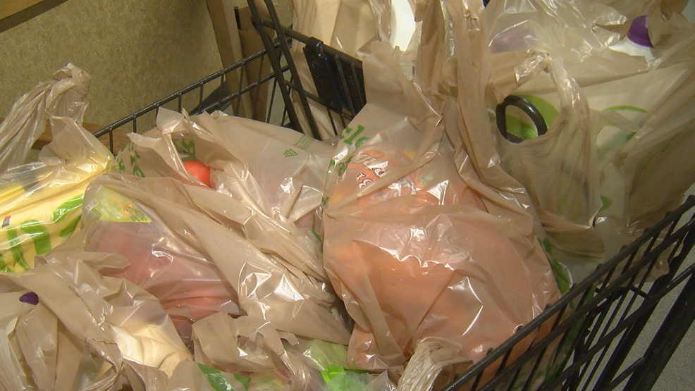 Customers trade in plastic bags for reusable ones at Wegmans WHAM
