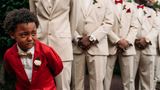 6-year-old boy breaks down into tears watching his mom walk down the aisle