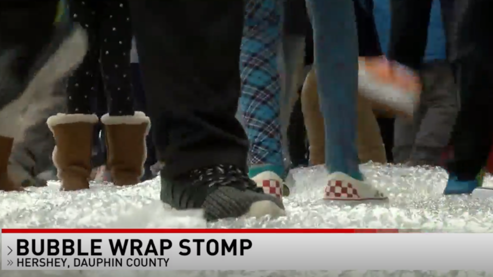 Kids trample giant sheets of bubble wrap on New Year's WHP