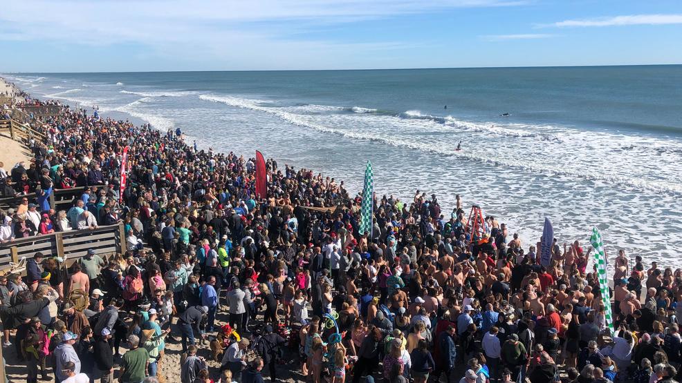 Annual Dolphin Dip in Surf City attracts thousands WCTI