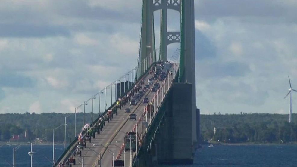 Hundreds of antique tractors ready to cross the Mackinac Bridge for